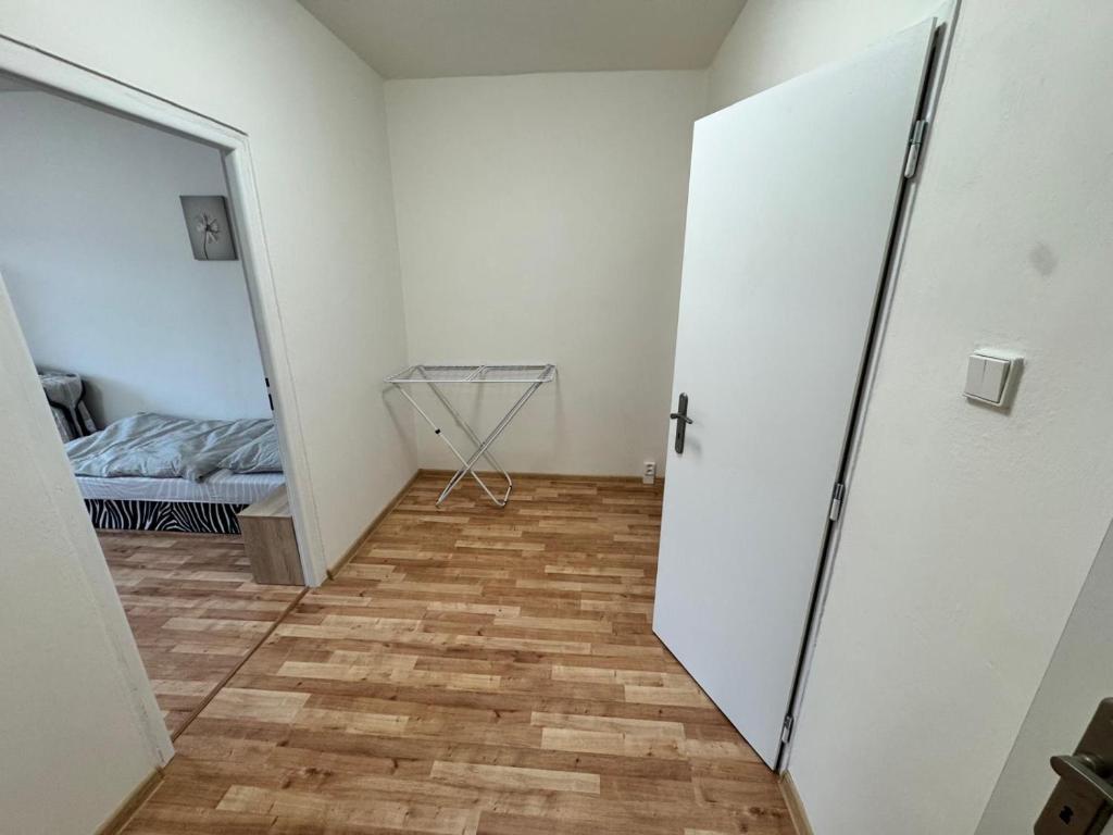 Postel nebo postele na pokoji v ubytování Apartmán pro 4 osoby, Kraslice