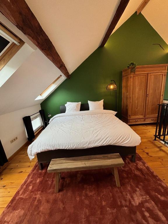 Postel nebo postele na pokoji v ubytování Vakantiewoning Huis 14