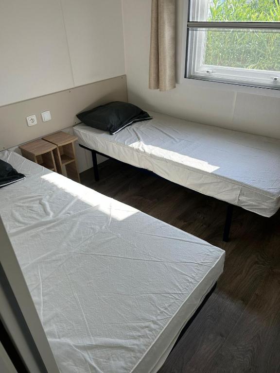 Postel nebo postele na pokoji v ubytování Azur 77
