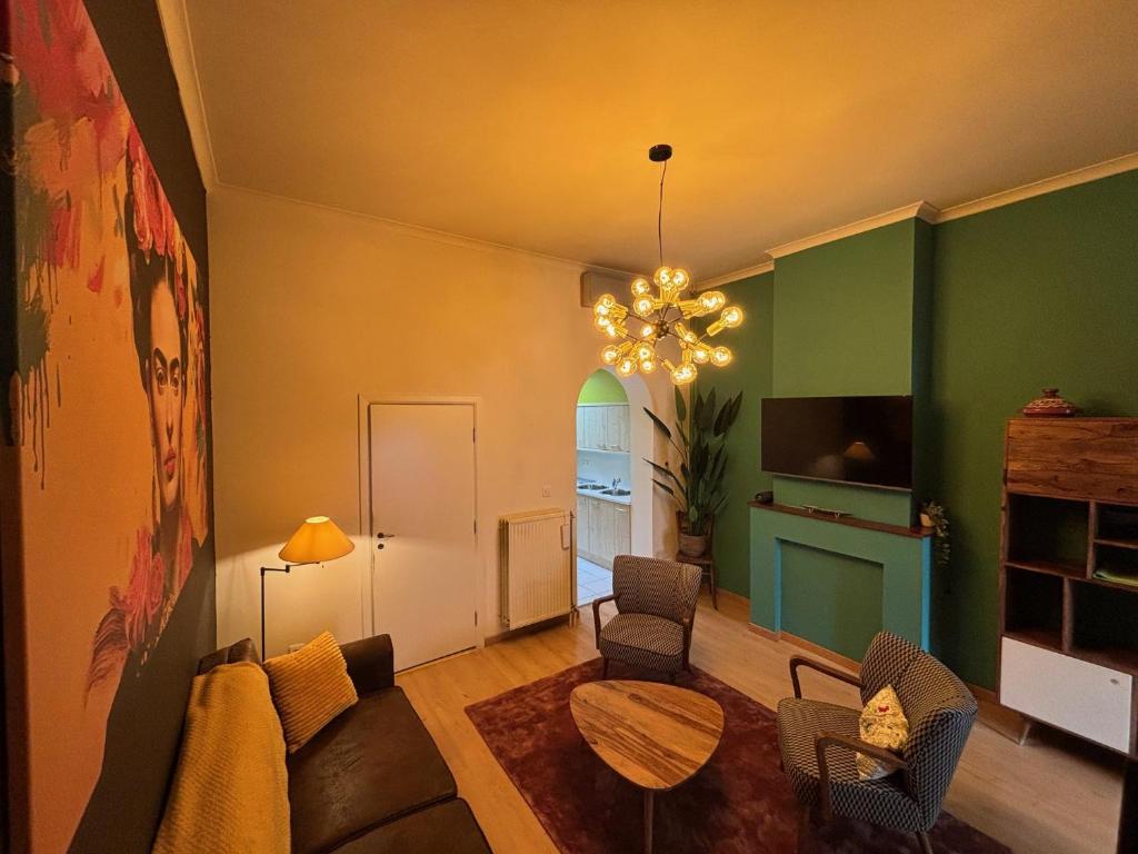 TV a/nebo společenská místnost v ubytování Vakantiewoning Huis 14