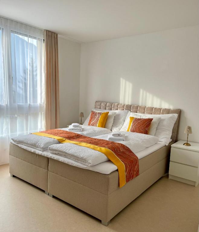Postel nebo postele na pokoji v ubytování Engler Apartments