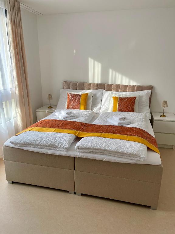 Postel nebo postele na pokoji v ubytování Engler Apartments