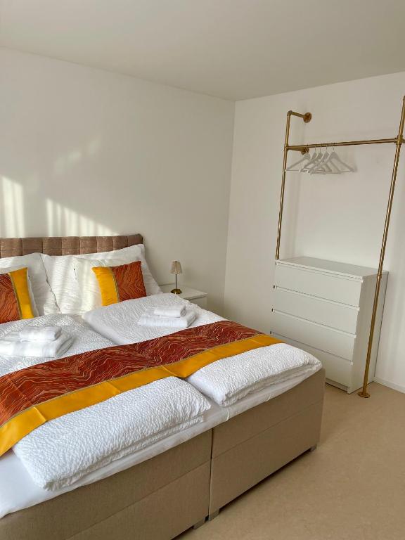 Postel nebo postele na pokoji v ubytování Engler Apartments