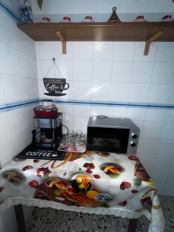 Kuchyň nebo kuchyňský kout v ubytování Dilman appartamento