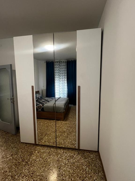 Postel nebo postele na pokoji v ubytování Dilman appartamento