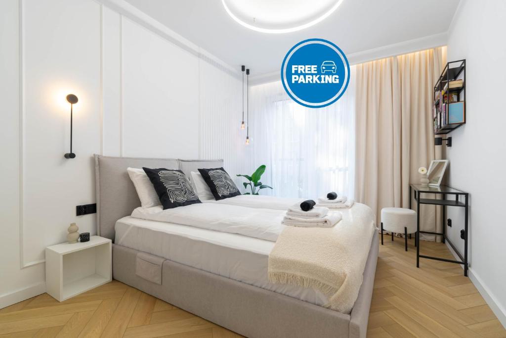 Ένα ή περισσότερα κρεβάτια σε δωμάτιο στο Lukier Muse- Katowice Centrum - Mikołowska - FREE GARAGE - self check-in