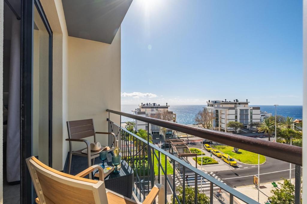 a balcony with a view of the ocean at Forum Ocean View 5B by Homie in Ilhéu do Gorgulho