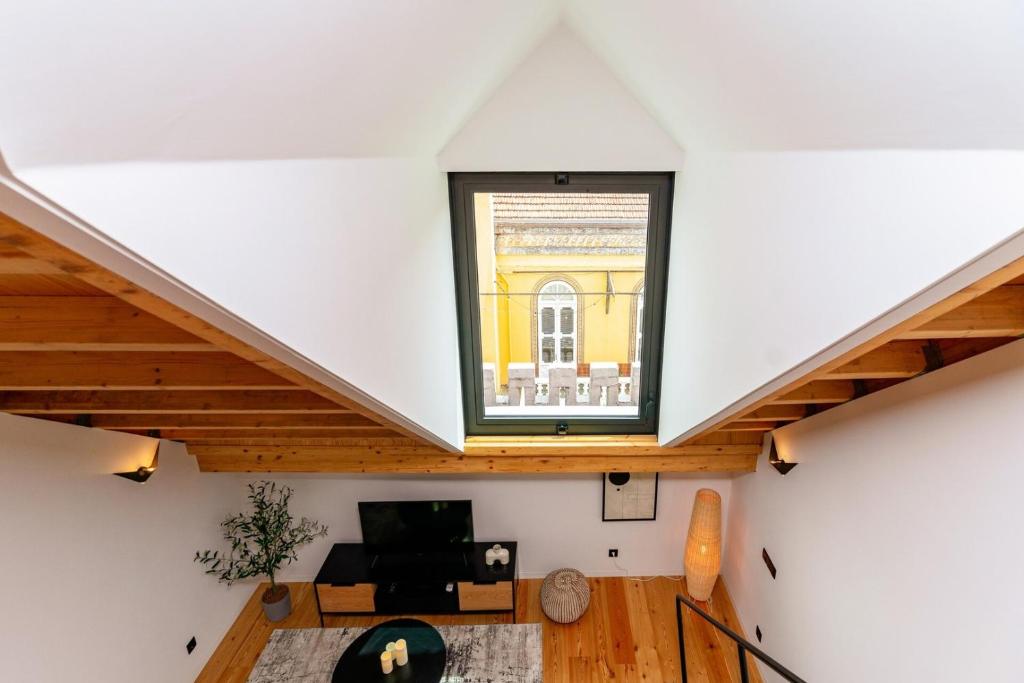 TV a/nebo společenská místnost v ubytování The coolest loft in the heart of the city center