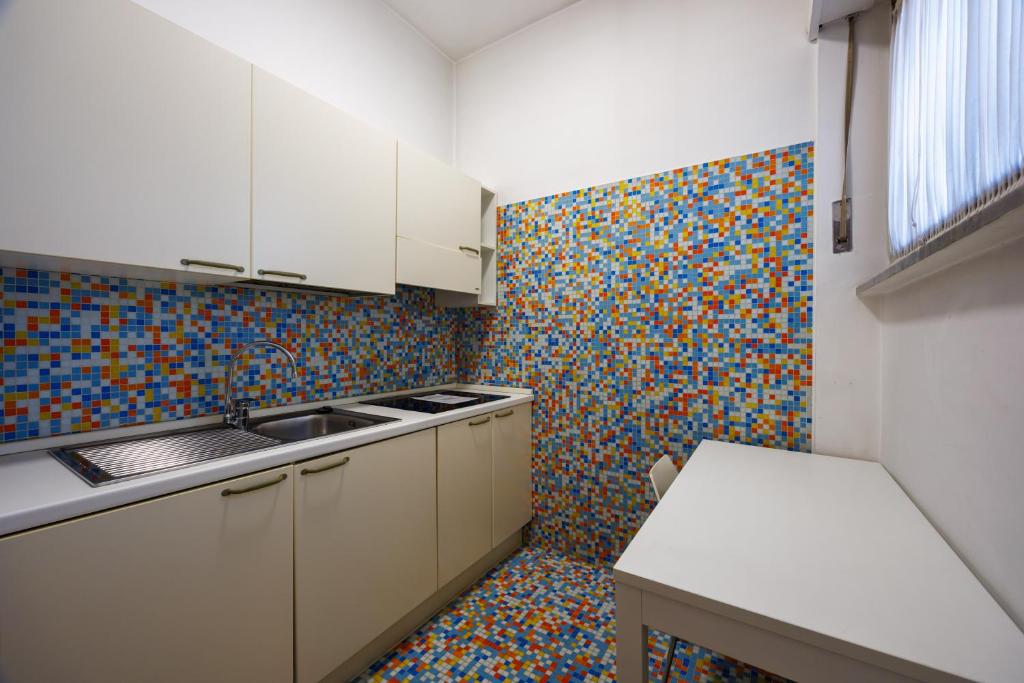 Kuchyň nebo kuchyňský kout v ubytování Residence Hotel Torino Uno