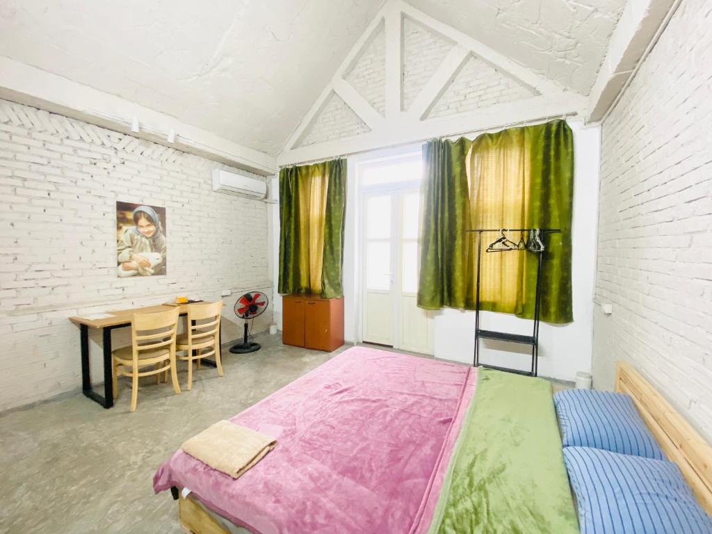 Postel nebo postele na pokoji v ubytování May's house (Nhà của Mây)