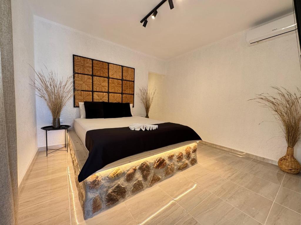 Giường trong phòng chung tại LA Casa Di Lusso Casa N1 Adults Only