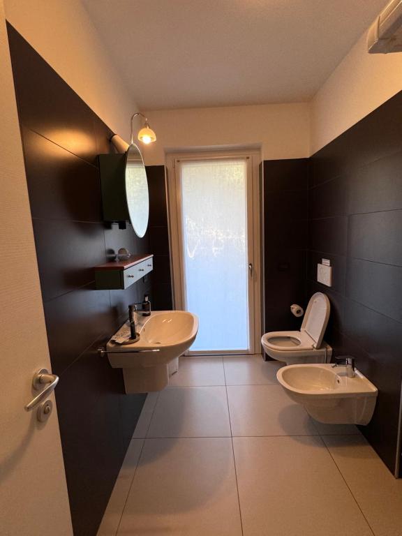 Kúpeľňa v ubytovaní GARDA LIVING APARTMENTS Riva del Garda
