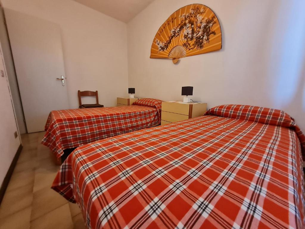 Postel nebo postele na pokoji v ubytování Appartamento I Rondinelli