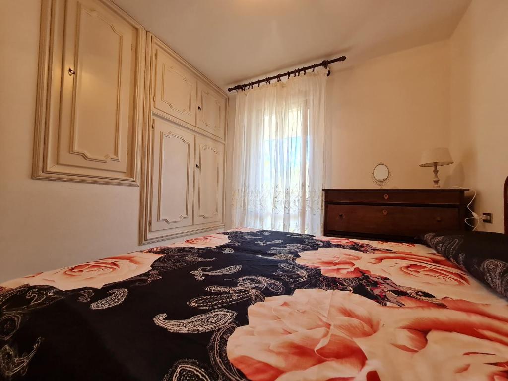 Postel nebo postele na pokoji v ubytování Appartamento I Rondinelli