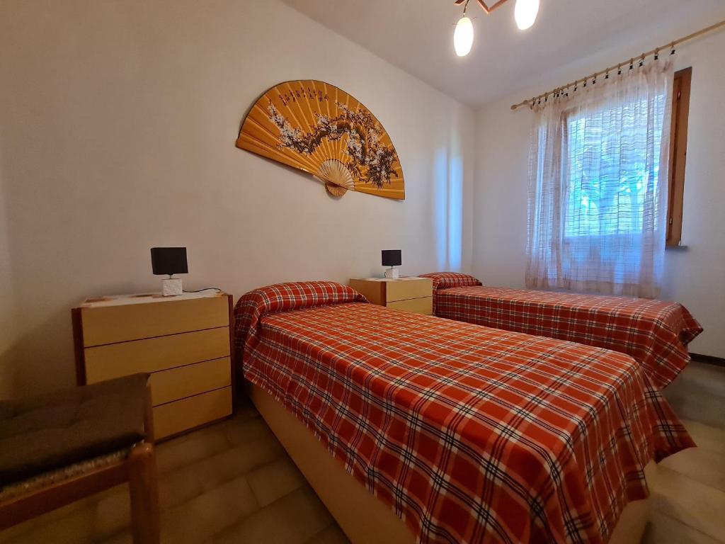 Postel nebo postele na pokoji v ubytování Appartamento I Rondinelli