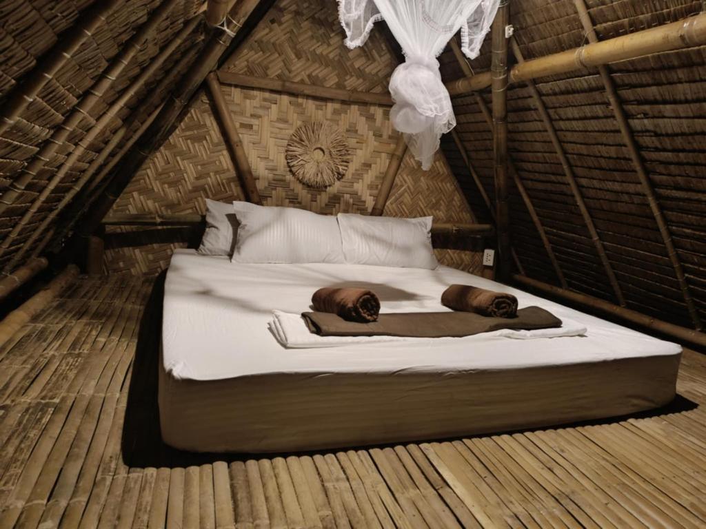 Postel nebo postele na pokoji v ubytování Ecocio Jungle Hostel
