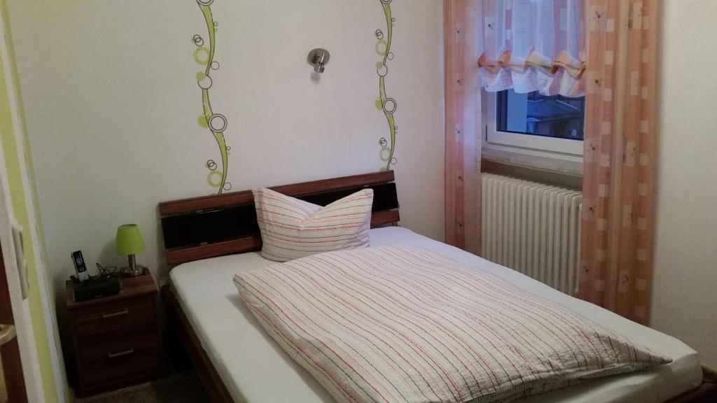 Postel nebo postele na pokoji v ubytování Landgasthof Hotel Sauer