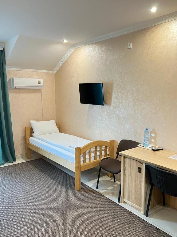 TV a/nebo společenská místnost v ubytování Park Hotel