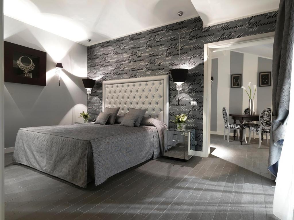Postel nebo postele na pokoji v ubytování Savoia Hotel Regency