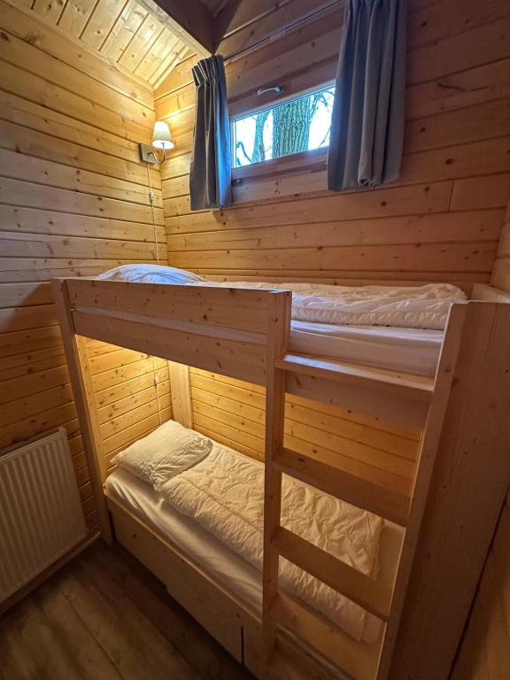 Postel nebo postele na pokoji v ubytování Het Hilkensberg Park