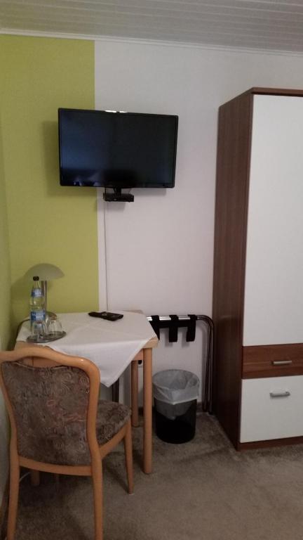 TV a/nebo společenská místnost v ubytování Landgasthof Hotel Sauer