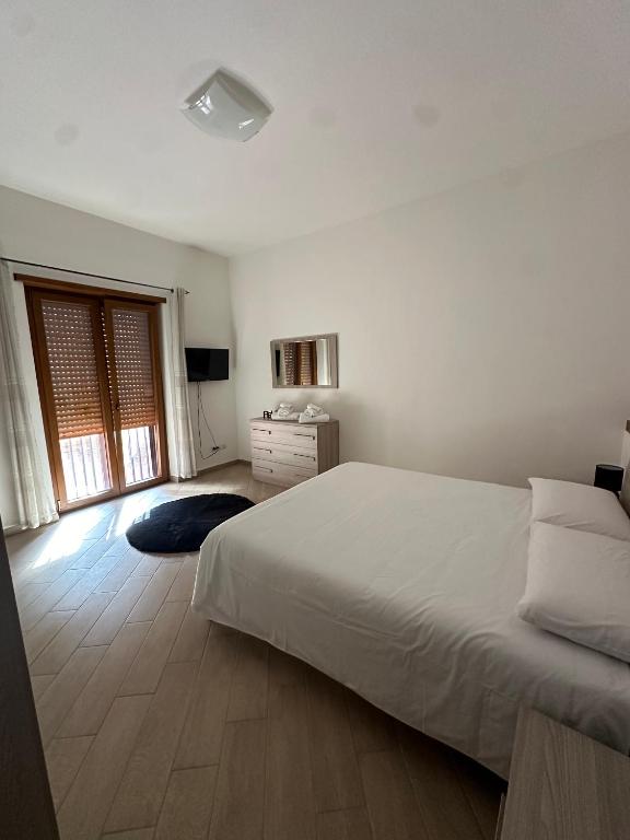 Postel nebo postele na pokoji v ubytování Livia's Home