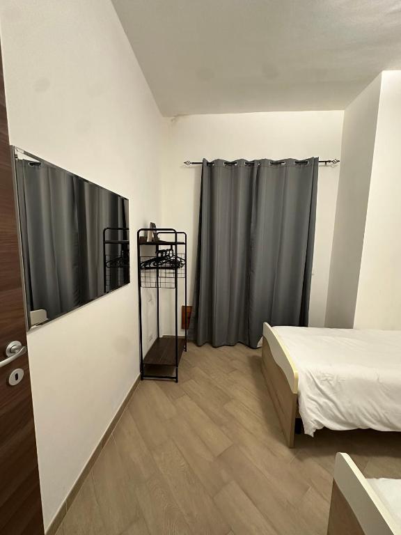 Postel nebo postele na pokoji v ubytování Livia's Home