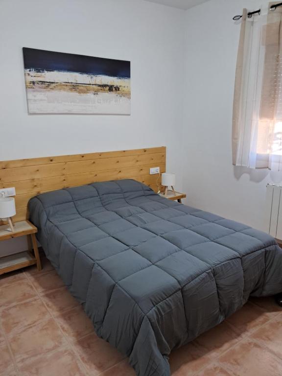 Postel nebo postele na pokoji v ubytování Cortijo Ojos del Prado