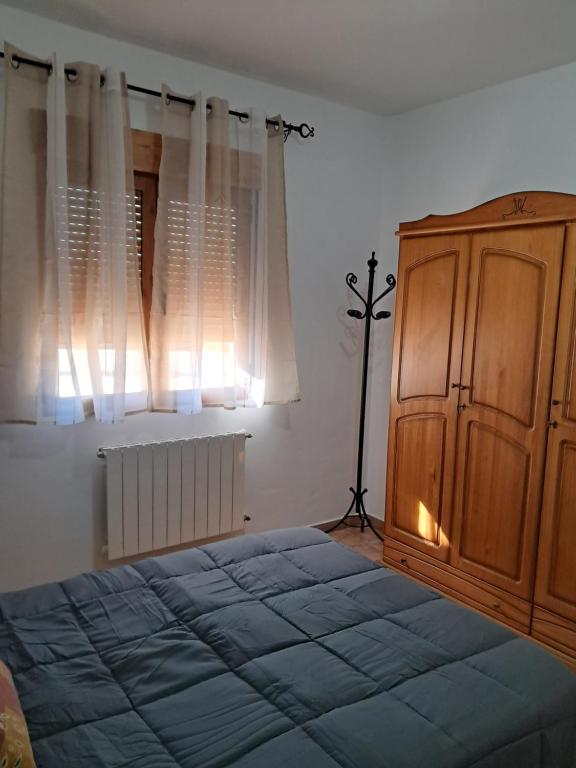 Postel nebo postele na pokoji v ubytování Cortijo Ojos del Prado
