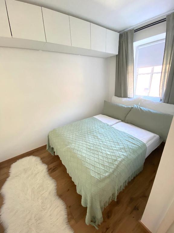 A bed or beds in a room at Chalet Badberg
