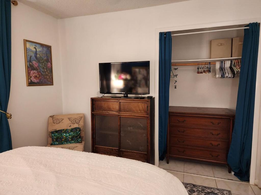 Voodi või voodid majutusasutuse 3BR Oasis with Pool in Cocoa toas