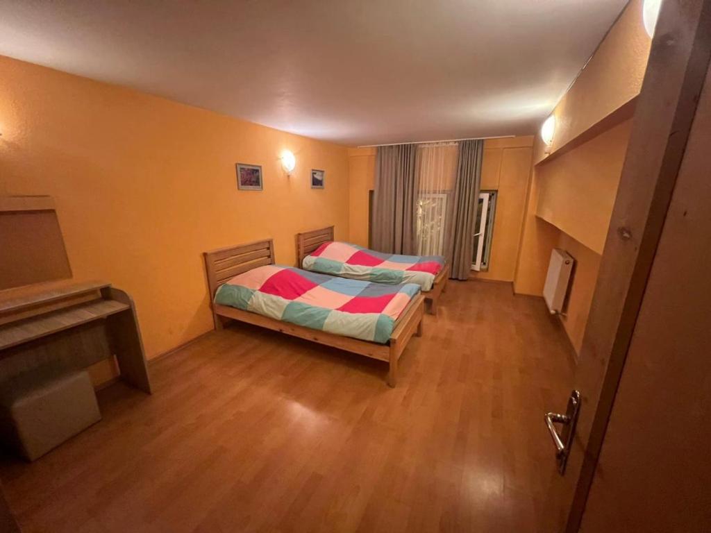 Postel nebo postele na pokoji v ubytování Galaxy Hostel