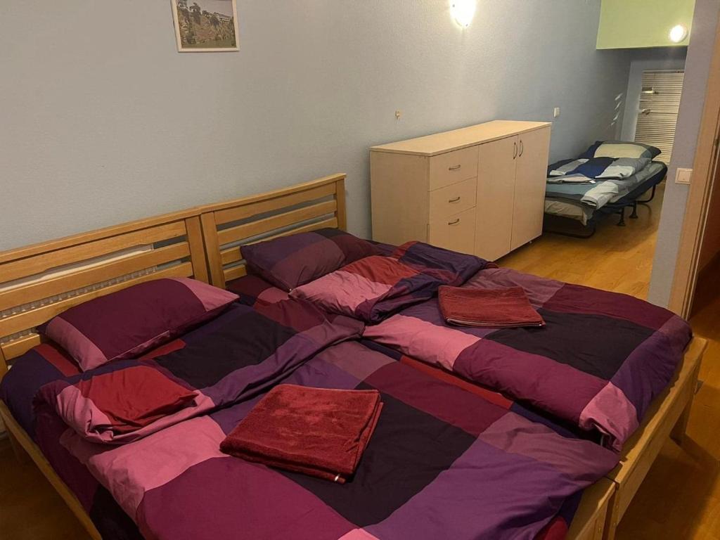 Postel nebo postele na pokoji v ubytování Galaxy Hostel