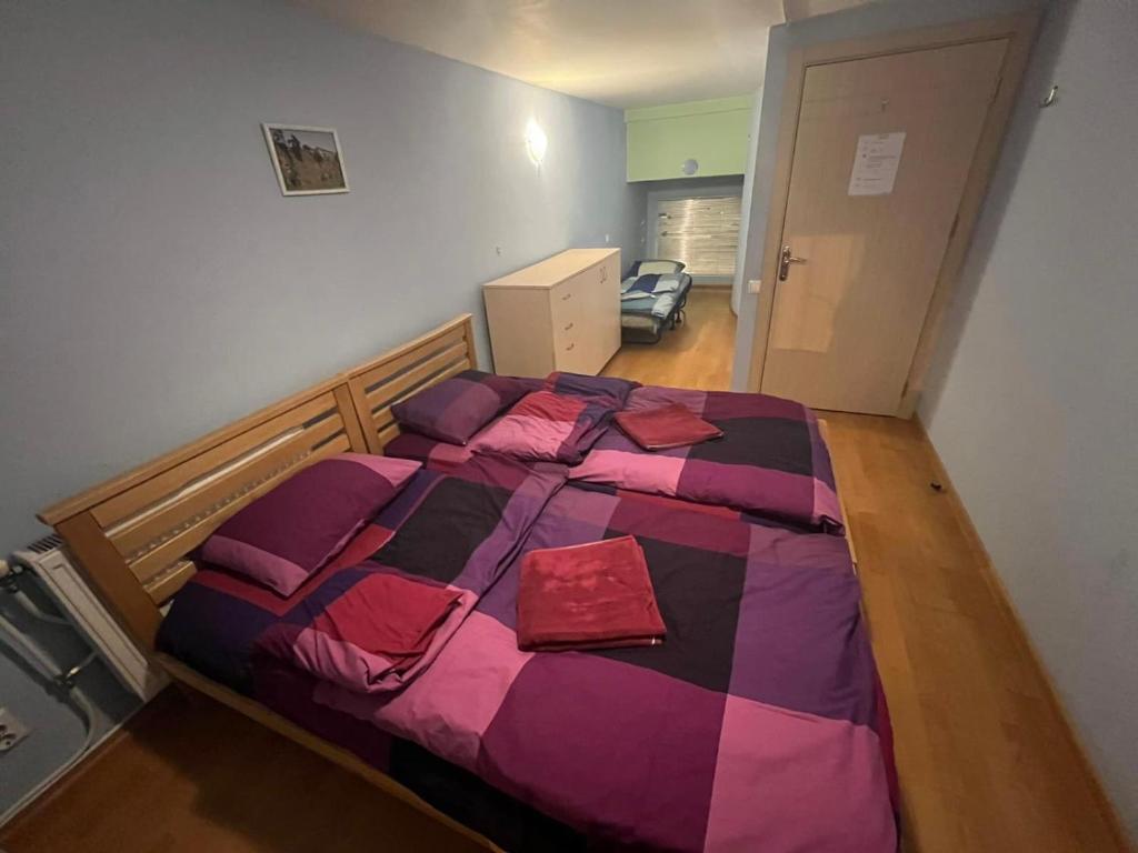 Postel nebo postele na pokoji v ubytování Galaxy Hostel