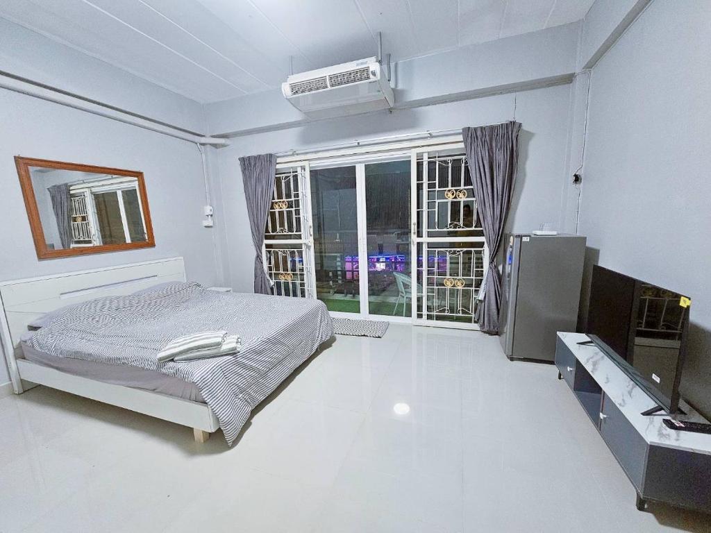 TV a/nebo společenská místnost v ubytování Future Hostel Pattaya
