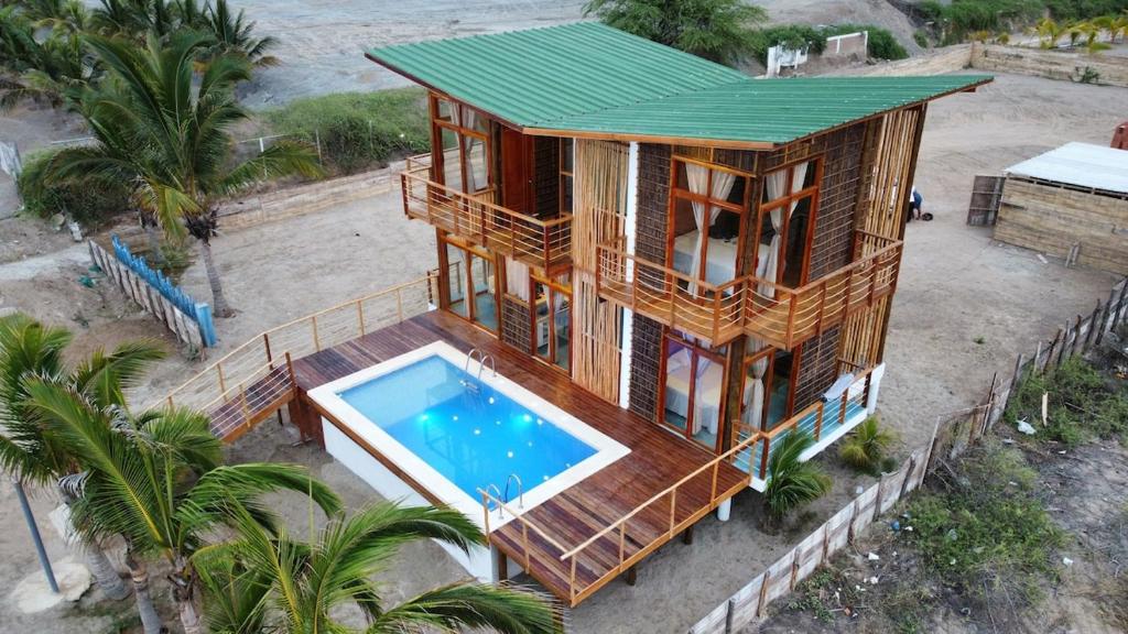 an overhead view of a house with a swimming pool at Top tower Caleta Grau Top Host in Caleta Grau