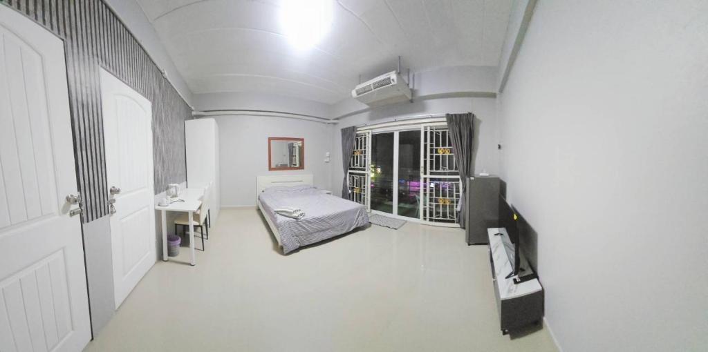 Postel nebo postele na pokoji v ubytování Future Hostel Pattaya