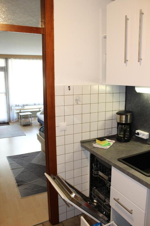 Kuchyň nebo kuchyňský kout v ubytování Appartement 21