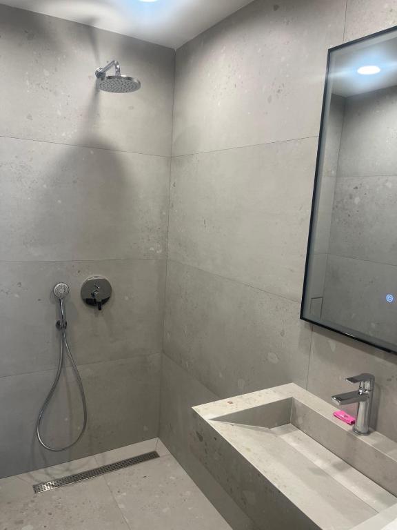 Koupelna v ubytování SPA Apartments Perun