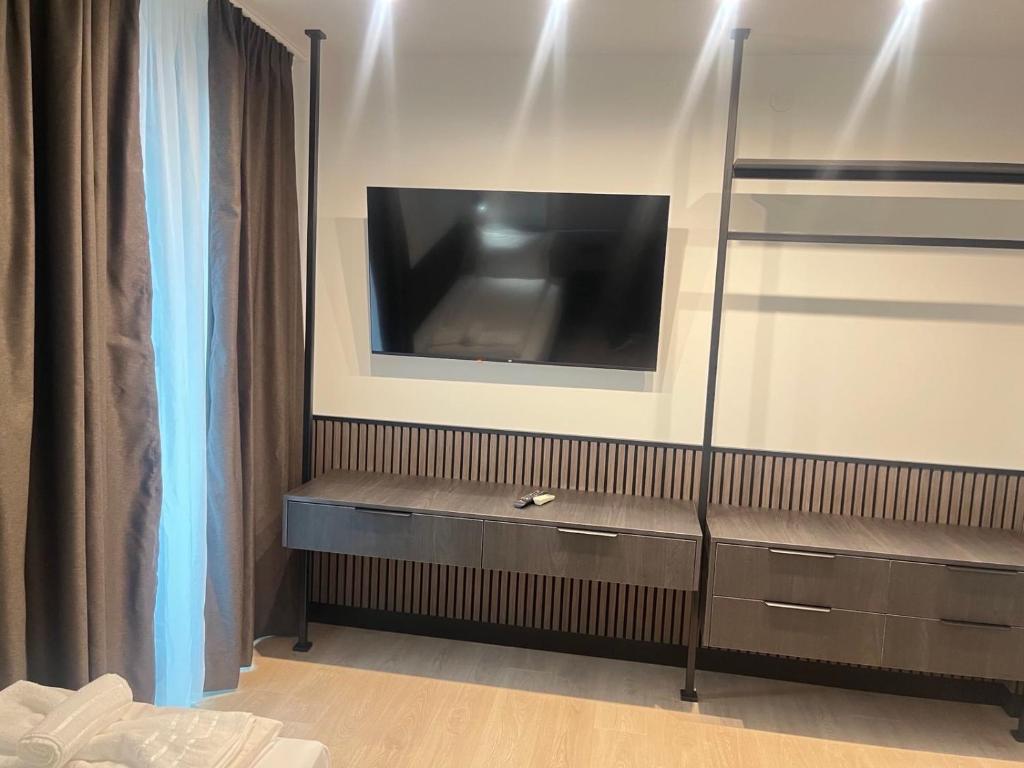 TV a/nebo společenská místnost v ubytování SPA Apartments Perun