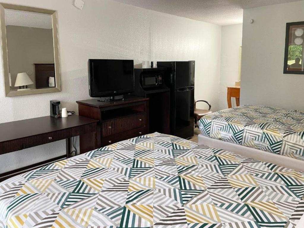 Ein Bett oder Betten in einem Zimmer der Unterkunft Fort Worth TX Downtown East