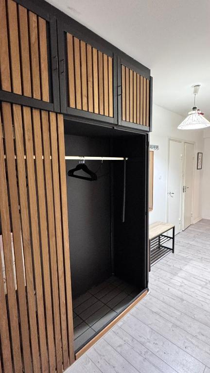 a horse stall in a room with a closet at Northern apartments in Kemi