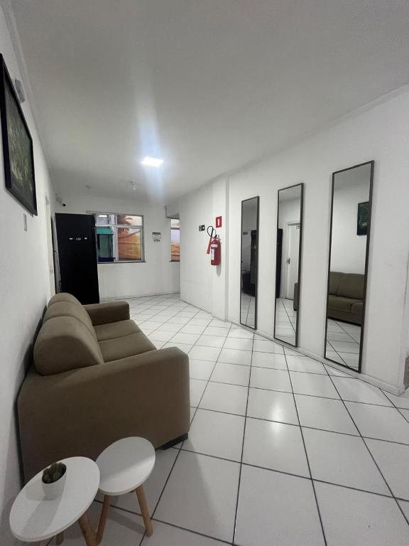 Posezení v ubytování Hotel Aconchegante