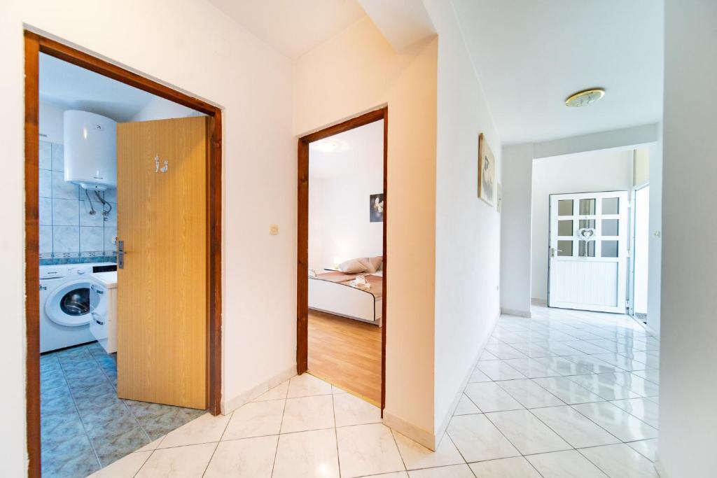 Posteľ alebo postele v izbe v ubytovaní Apartments Lores