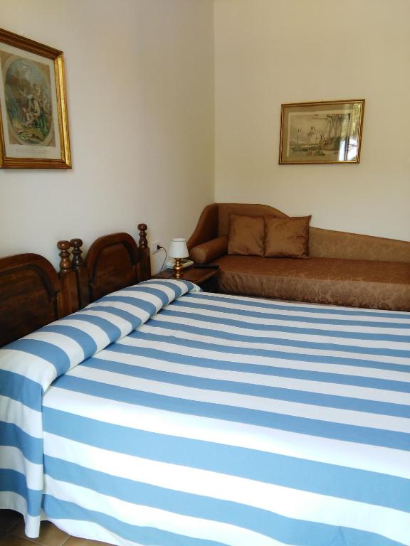 Postel nebo postele na pokoji v ubytování Ristorante Hotel Mira