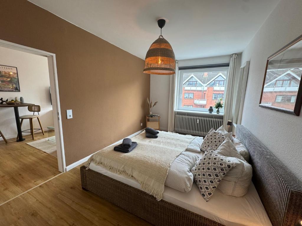 En eller flere senge i et værelse på Beachfront Escape - Teil der HolidayEscapes Kollektion