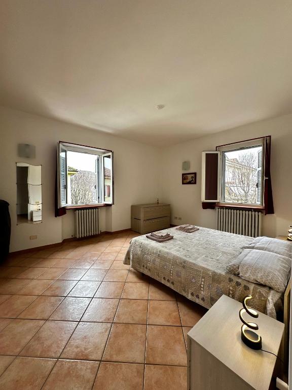 Postel nebo postele na pokoji v ubytování Spazioso appartamento 2