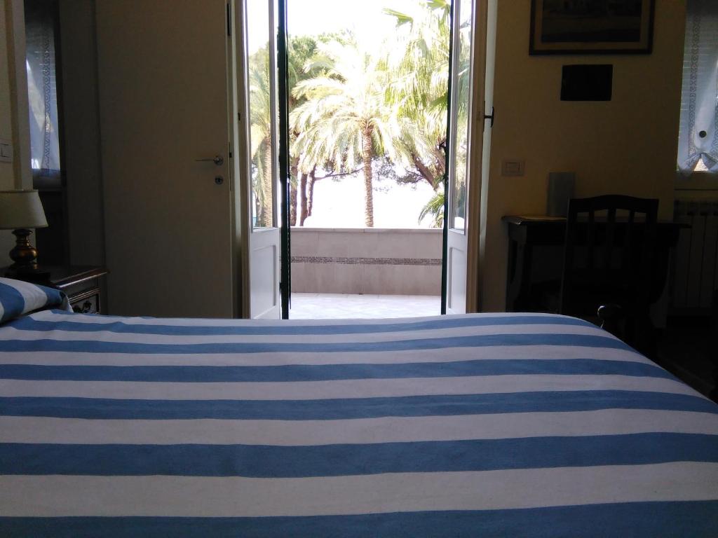 Postel nebo postele na pokoji v ubytování Ristorante Hotel Mira