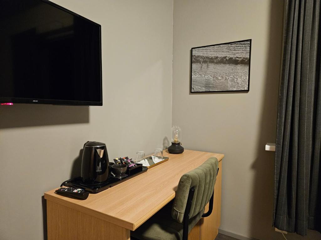 TV a/nebo společenská místnost v ubytování Long Valley Lodge
