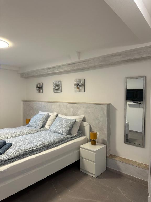 Ένα ή περισσότερα κρεβάτια σε δωμάτιο στο Apartment Bilić